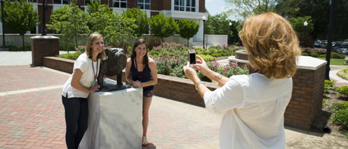 Parent taking picture of students with Bully