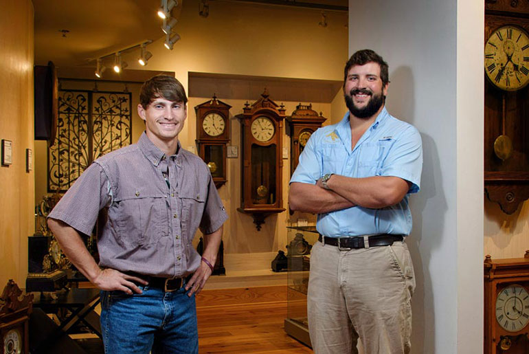 two male students at museum