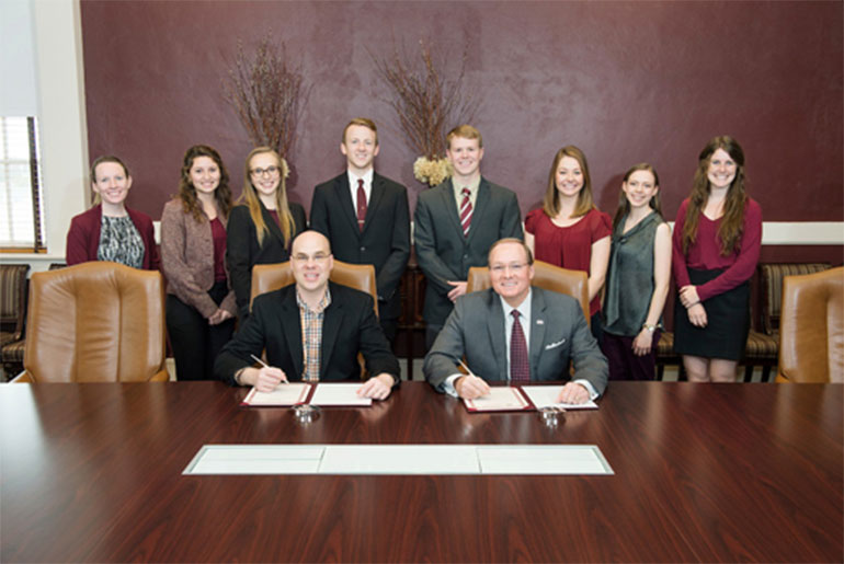 officials and student recognize National Nutrition month with proclamation signing