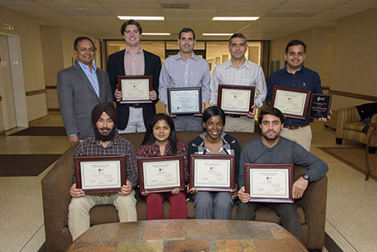 group of students with awards