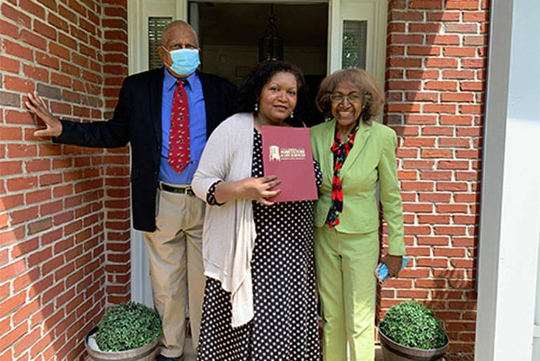 Donna Michelle Smith, center, with her parents, Don and Ann Smith.