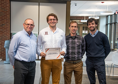 From left to right, Adam Overfield, senior vice president, Cubico Sustainable Investments; William Stark, MSU agronomy graduate student;