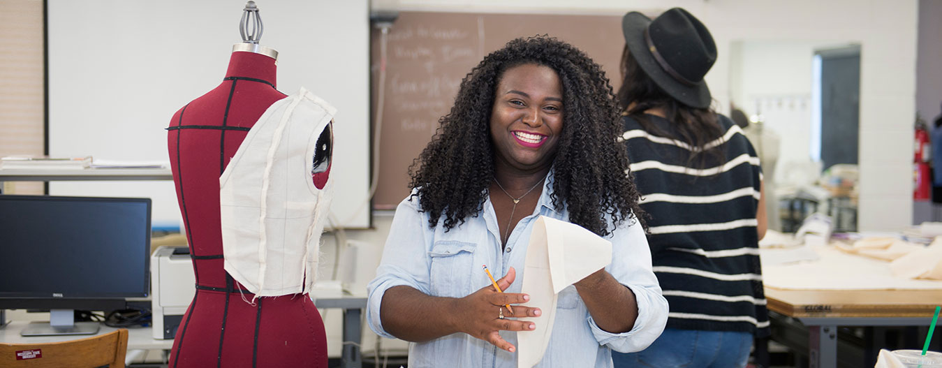 Fashion Design student working with fabric