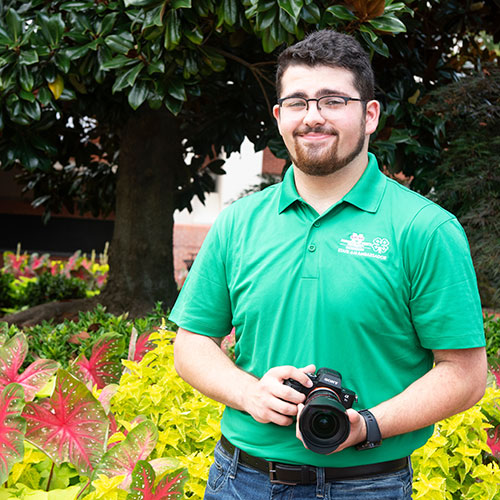 Male student with camera